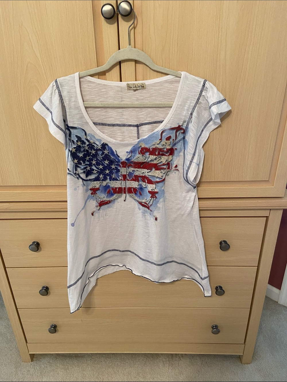 live and let live White Scoop Neck Tee with Red and Blue Flag Butterfly